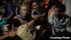 Elders and villagers in Areng Valley celebrate a spiritual ceremony called "Thvay Bangkum Kru" or "To Welcome the Spirit". (Courtesy photo of Mam Kalyanee) 