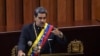 Presiden Venezuela Nicolas Maduro menyampaikan pidato di hadapan hakim Mahkamah Agung dalam upacara pembukaan tahun peradilan baru di Caracas pada 31 Januari 2024. (Foto: AFP/Pedro Rances Mattey)