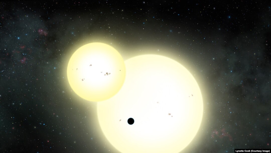 Artist's interpretation of Kepler-1647b transiting a pair of stars