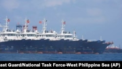 Beberapa dari 220 kapal China terlihat ditambatkan di Whitsun Reef, Laut China Selatan. (Foto: Philippine Coast Guard/National Task Force-West Philippine Sea via AP)