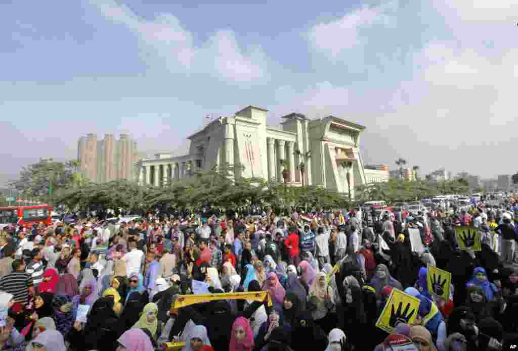 Supporters of Egypt's ousted President Mohammed Morsi protest Morsi's trial in front of the supreme constitutional court in Cairo, Egypt, Nov. 4, 2013. 