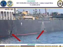 This June 13, 2019, image released by the U.S. military's Central Command, shows damage and a suspected mine on the Kokuka Courageous in the Gulf of Oman near the coast of Iran.