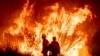 Cesar Plaza becomes emotional while looking at his home destroyed by the Eaton Fire in Altadena, California, Jan. 9, 2025.