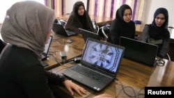 Afghan coders practice at the Code to Inspire computer training center in Herat, Afghanistan, April 24, 2018. 