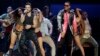 FILE - Luis Fonsi, left, and Daddy Yankee perform during the Latin Billboard Awards in Coral Gables, Fla. 