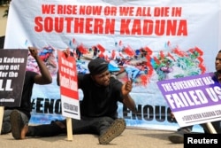 People gather to protest the incessant killings in southern Kaduna and insecurities in Nigeria, at the U.S. Embassy in Abuja, Nigeria, Aug. 15, 2020.