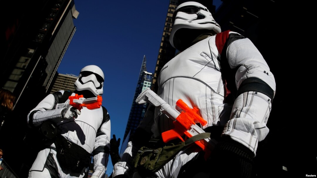FILE - People dressed as Stormtroopers from Star Wars Rogue One walk in Times Square on Christmas Day in Manhattan, New York City, Dec. 25, 2016. 