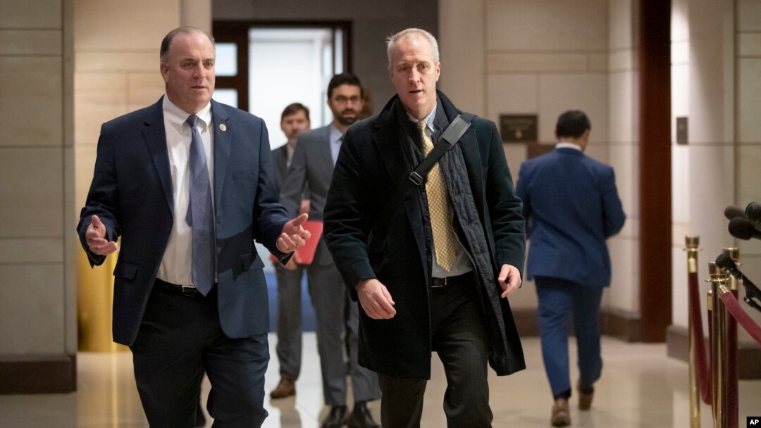 Rep. Dan Kildee, D-Mich (L), and Rep. Sean Patrick Maloney, D-N.Y., arrive for a classified security briefing on the killing of Jamal Khashoggi and Saudi Arabia's war in Yemen, on Capitol Hill in Washington, Dec. 13, 2018. 