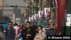 The campaign is driven largely by Egyptians' thirst for stability after years of turbulence following the popular uprising of 2011 that threw out longtime leader Hosni Mubarak. A campaign banner in downtown Cairo has the signatures of Sissi supporters. 