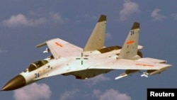 Un avion de combat J-11 chinois, le 19 août 2014. (Photo d'illustration)