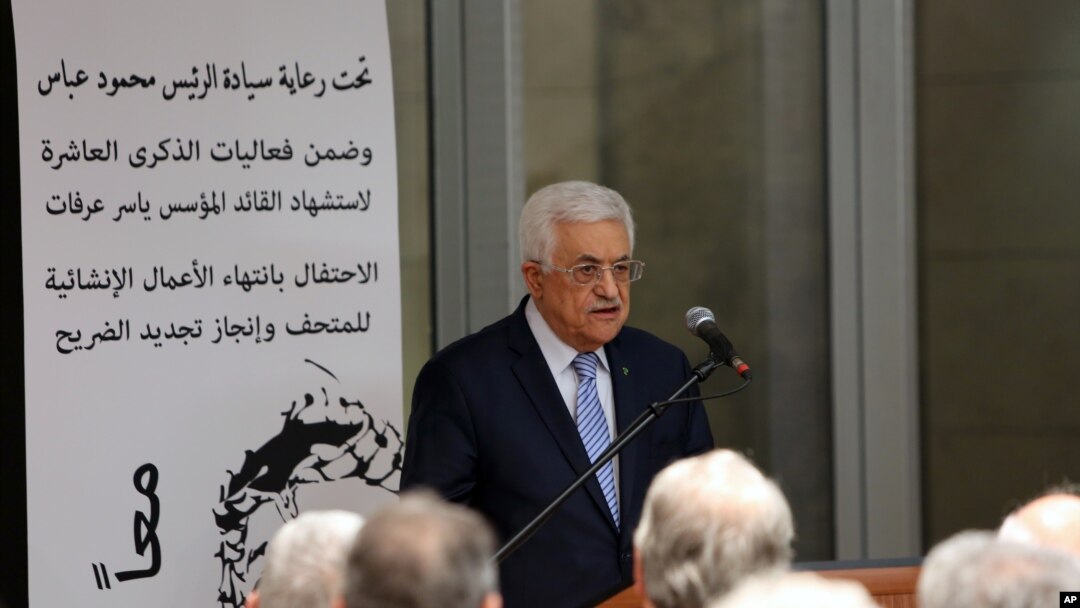 FILE - Palestinian President Mahmoud Abbas speaks at the opening of a museum for late Palestinian leader Yasser Arafat in the West Bank city of Ramallah on Sunday, Nov. 9, 2014.