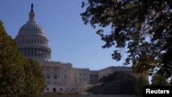 FILE - The inaugural platform is seen under construction in front of the U.S. Capitol building in Washington, October 31, 2024.