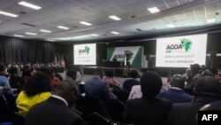 South Africa's Minister of Trade and Industry Ebrahim Patel speaks on a panel during the first day of the 20th African Growth and Opportunity Act summit in Johannesburg, November 2, 2023.