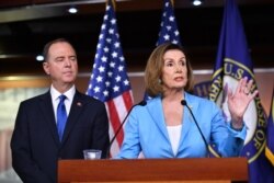FILE - House Speaker Nancy Pelosi and House Intelligence Committee chairman Adam Schiff speak during a press conference at the U.S. Capitol in Washington, Oct. 2, 2019.