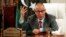 Libya's Prime Minister Ali Zeidan speaks during a joint news conference with Oil Minister Abdelbari al-Arusi at the Prime Minister's Office in Tripoli, July 2013.