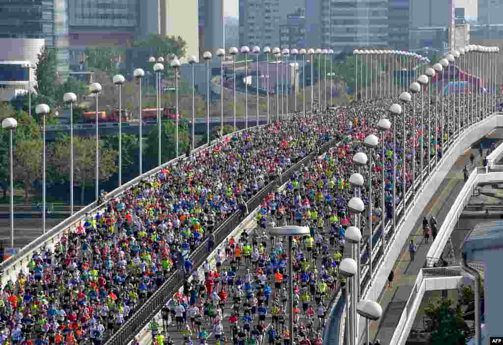 Runners participate in the Vienna City Marathon in Vienna, Austria.