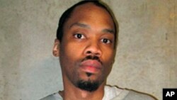 FILE - This photo provided by the Oklahoma Department of Corrections shows Julius Jones Feb. 5, 2018.