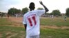 In this June 28, 2012 photo, a footballer for the new South Sudan national team wears a brand new shirt as the country prepares to play its first match around its first anniversary on July 9.