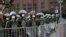 Soldiers wearing masks to protect themselves amid the new coronavirus pandemic, guard the Eastern Military Command during a protest against racism and hate crimes during a Black Lives Matter demonstration in Rio de Janeiro, Brazil, June 7, 2020. 