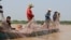 Villagers are net fishing in the Tonle Sap Lake, in Kampong Chhnang province, Cambodia, on March 12, 2020. (Sun Narin/VOA Khmer) 