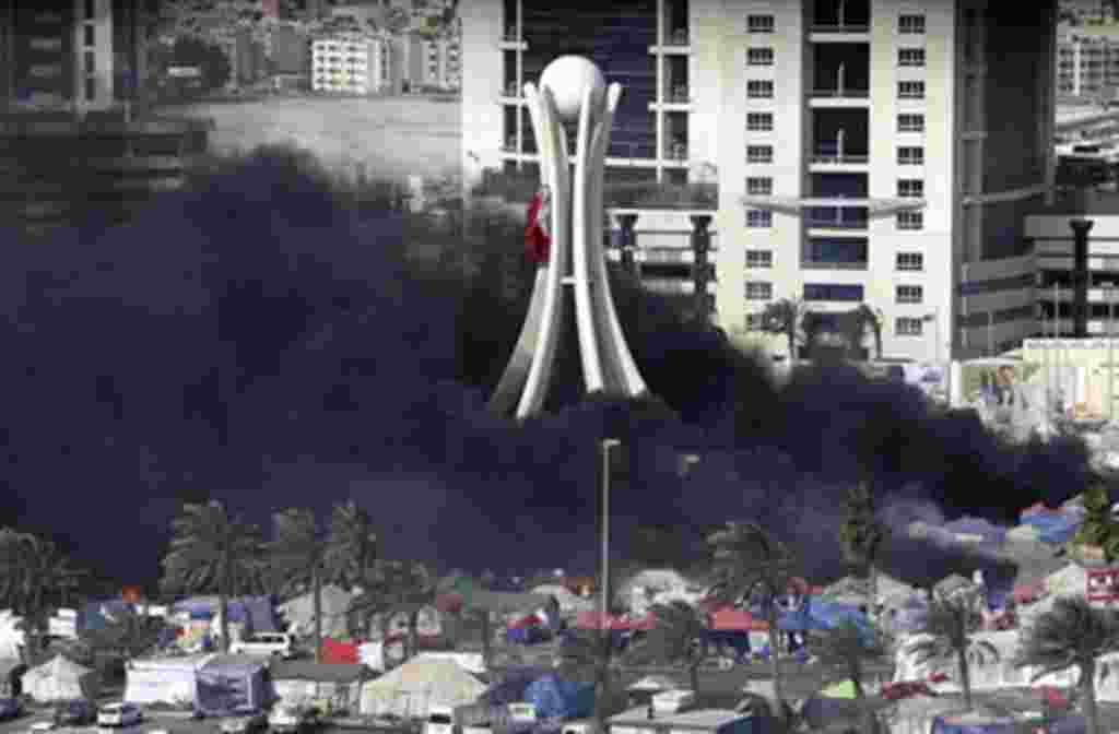 Black smoke billows from burning tents in Pearl Square in Bahraini capital Manama on March 16, 2011