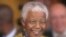 Mandela wearing another one of Buirski’s famous silk shirts