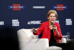 FILE - Democratic presidential candidate Senator Elizabeth Warren responds to a question during a forum. in Las Vegas, Nevada, Oct. 2, 2019.