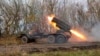 FILE - A self-propelled rocket launcher fires toward Ukrainian positions in the Kursk region, Russia, in this photo taken from video, Dec. 3, 2024. The White House reported Dec. 27 that 1,000 North Korean troops were killed or injured in the Kursk region in the last week alone.