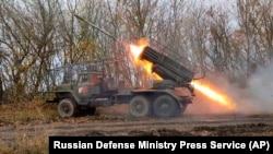 FILE - A self-propelled rocket launcher fires toward Ukrainian positions in the Kursk region, Russia, in this photo taken from video, Dec. 3, 2024. The White House reported Dec. 27 that 1,000 North Korean troops were killed or injured in the Kursk region in the last week alone.