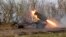 FILE - A self-propelled rocket launcher fires toward Ukrainian positions in the Kursk region, Russia, in this photo taken from video, Dec. 3, 2024. The White House reported Dec. 27 that 1,000 North Korean troops were killed or injured in the Kursk region in the last week alone.
