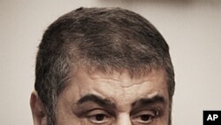 In this January 24, 2012 photo, Muslim Brotherhood nominated deputy leader and presidential candidate Khayrat el-Shater speaks during an interview with the Associated Press in Cairo, Egypt.