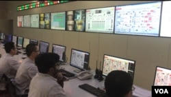 FILE - Chinese and Pakistani engineers jointly operate the Port Qasim Power Plant in Karachi, Pakistan, as shown in this 2019 photo.