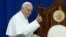Pope Francis gestures to prisoners at Curran-Fromhold Correctional Facility in Philadelphia, Sept. 27, 2015. 