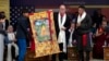 FILE - U.S. Representative Jim McGovern, part of a U.S. delegation, is presented with a traditional Tibetan Buddhist painting at a public event in Dharamshala, India, on June 19, 2024. McGovern on Aug. 2 said he would wear Chinese sanctions against him "as a badge of honor."