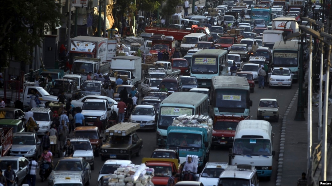 Cars are held up in a traffic jam in downtown Cairo, September 2013.