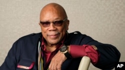 FILE - Music producer Quincy Jones poses for a portrait to promote his documentary "Quincy" during the Toronto Film Festival on Sept. 7, 2018, in Toronto.