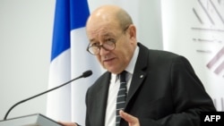 French Defense Minister Jean-Yves Le Drian gives a press conference following an Informal Meeting of EU Defense Ministers in Riga, Latvia, Feb. 19, 2015. 