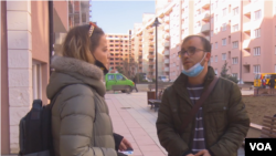 FILE - In a screenshot from video, Kosovo investigative reporter Visar Duriqi speaks with VOA Albanian Service stringer Edlira Bllaca. 