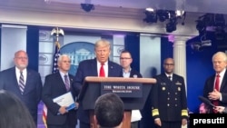 U.S. President Donald Trump briefs reporters at a news conference on the latest steps the United States is taking to fight the coronavirus disease (COVID-19) outbreak, Washington D.C., March 22, 2020. (C. Presutti/VOA)