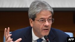 Perdana Menteri Italia Paolo Gentiloni dalam konferensi pers di Roma, Kamis (28/12). 