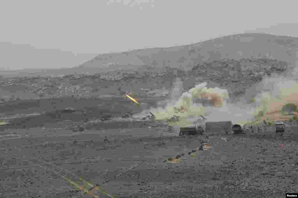 Yemeni army forces fire a missile towards positions of al-Qaida-linked militants in Abyan, June 10, 2012.