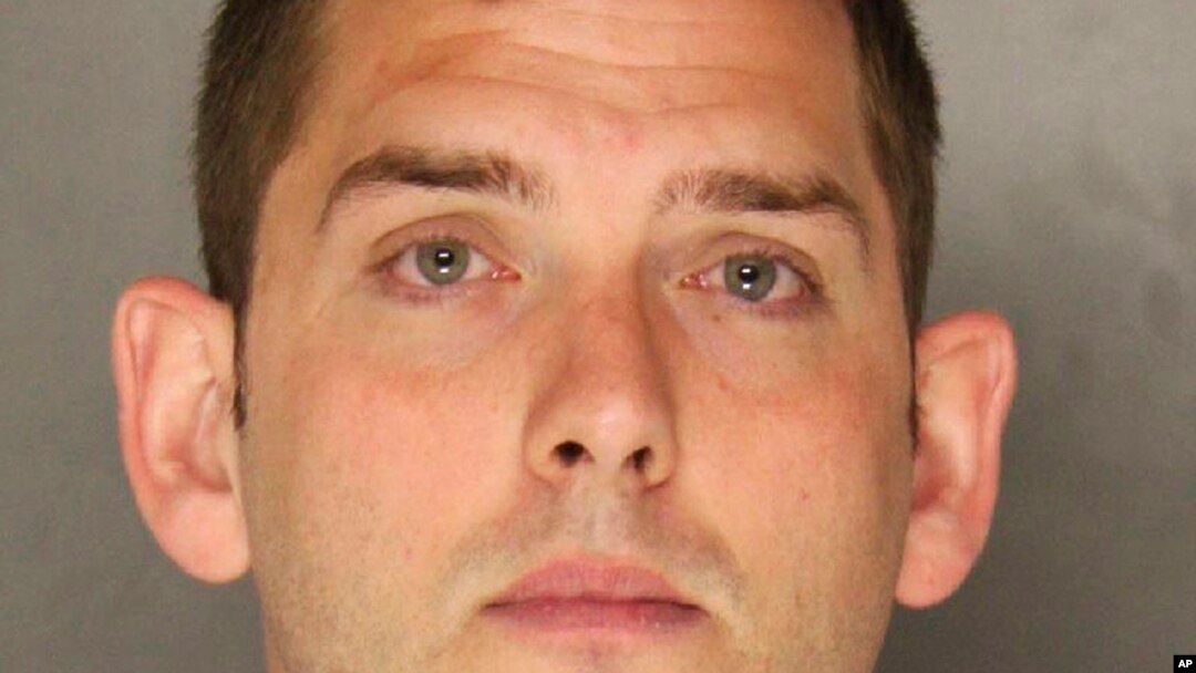 This undated photo provided by the Allegheny County District Attorney shows Michael Rosfeld, an East Pittsburgh, Pa., police officer. Rosfeld was charged with homicide Wednesday, June 27, 2018, in the shooting death of Antwon Rose Jr. after a traffic stop June 19 in East Pittsburgh. 