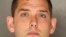 This undated photo provided by the Allegheny County District Attorney shows Michael Rosfeld, an East Pittsburgh, Pa., police officer. Rosfeld was charged with homicide Wednesday, June 27, 2018, in the shooting death of Antwon Rose Jr. after a traffic stop June 19 in East Pittsburgh. 