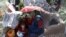 Internally displaced Afghans from northern provinces, who fled their home due to fighting between the Taliban and Afghan security personnel, take refuge in a public park Kabul, Afghanistan, Aug. 13, 2021. 