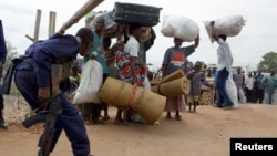 Policier azali kokengela baye balingi kokima bitumba na Bunia, 20 juin 2003