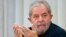 FILE - Brazil's former President Luiz Inacio Lula da Silva attends an extraordinary Worker's Party leaders meeting in Sao Paulo, Brazil, March 30, 2015. 