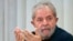 FILE - Brazil's former President Luiz Inacio Lula da Silva attends an extraordinary Worker's Party leaders meeting in Sao Paulo, March 30, 2015. 