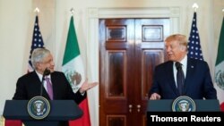 El presidente de EE.UU., Donald Trump junto al presidente mexicano Andrés Manuel López Obrador durante una declaración conjunta en la Casa Blanca, el 9 de julio de 2020.