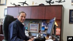 In this May 1, 2017 photo Craig Campbell, the chief executive officer of Alaska Aerospace Corporation, poses for a photo at his office in Anchorage, Alaska.