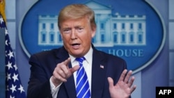 FILE - U.S. President Donald Trump speaks during a then-daily briefing on the coronavirus, in the Brady Briefing Room of the White House, April 23, 2020, in Washington, DC.